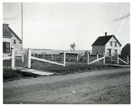 Castalia, Dr.MacAulay's fence, two gates, part of house and barn at left.John Graham house at rig...